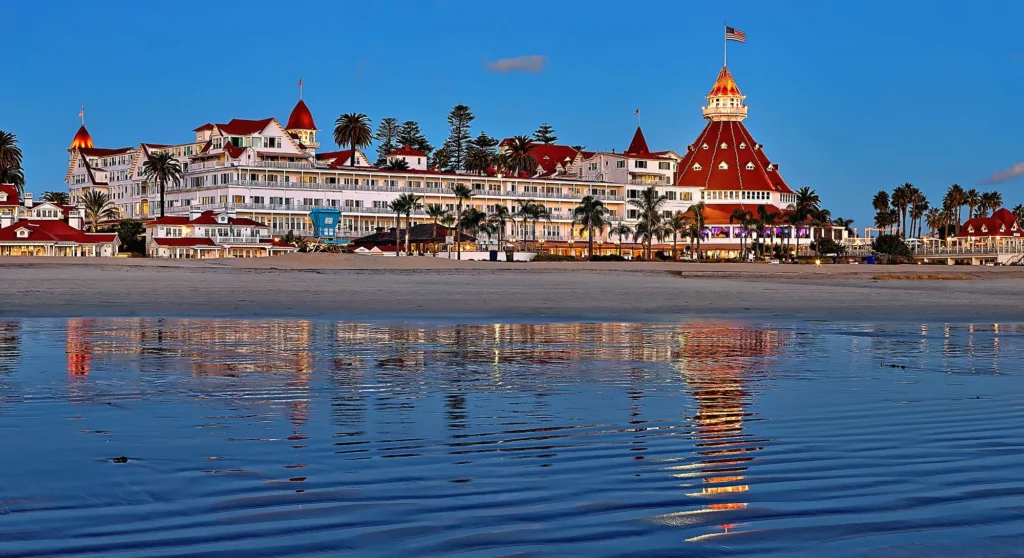 "A scenic view of Coronado Beach with the historic Hotel del Coronado in the background."