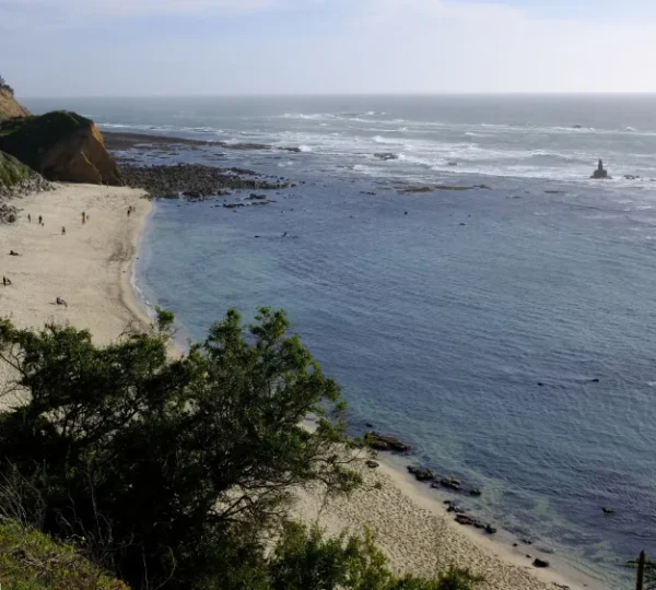 "Tranquil Moss Beach, California, with scenic views of the Pacific Ocean."